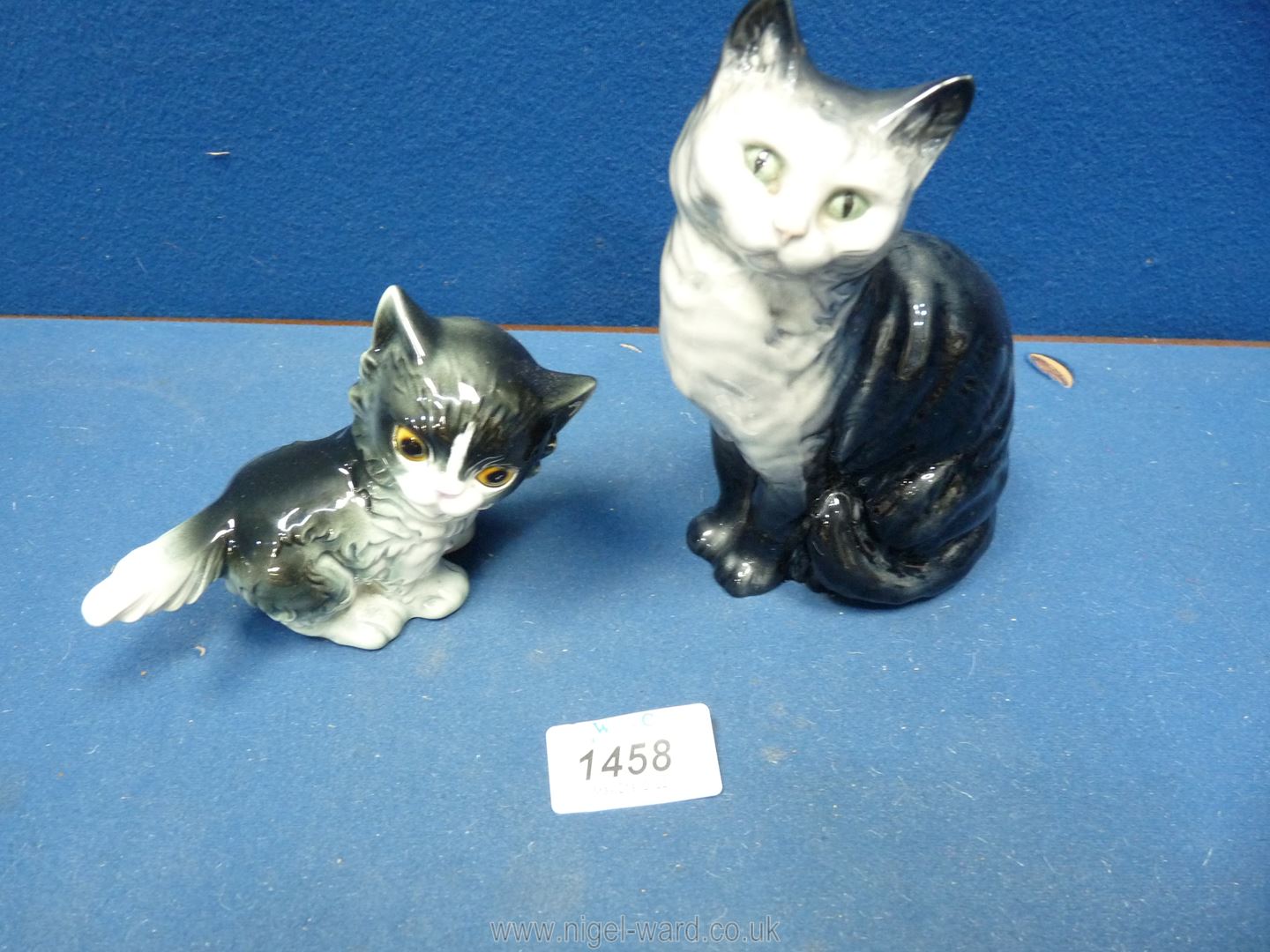 A Beswick seated cat with smoky blue,