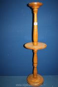 A lightwood Smokers stand, 32'' tall.