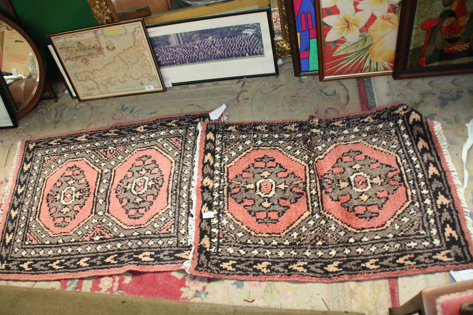 A pair of Afghan Uzbeck hand knotted rugs, 37" x 25" in brown/rust colour-way.