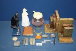 A black figure of sitting Egyptian cat, an Avon Elusive Cologne bottle, serve-easy pickle jar,