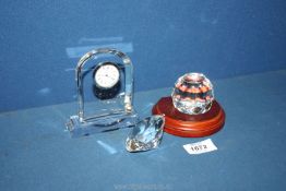 A small quantity of glass including miniature quartz clock, Bohemia paperweight and one other,