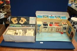 A boxed Tin Toy Combination Kitchen set,