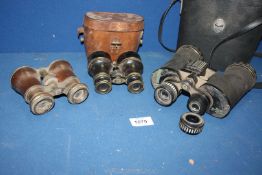 Three pairs of binoculars to include 'Le Jockey Club, Paris' field binoculars, a cased pair of J.H.