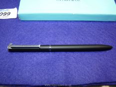 A matt black ball-point pen, the T shape pocket clip stamped 'Sterling Tiffany & Co,