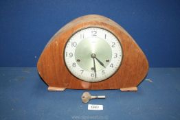 A Smiths Westminster chiming Mantle clock, with key, 8 1/2" tall.