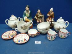 A quantity of oriental style china including part teaset, 3 oriental figures etc.