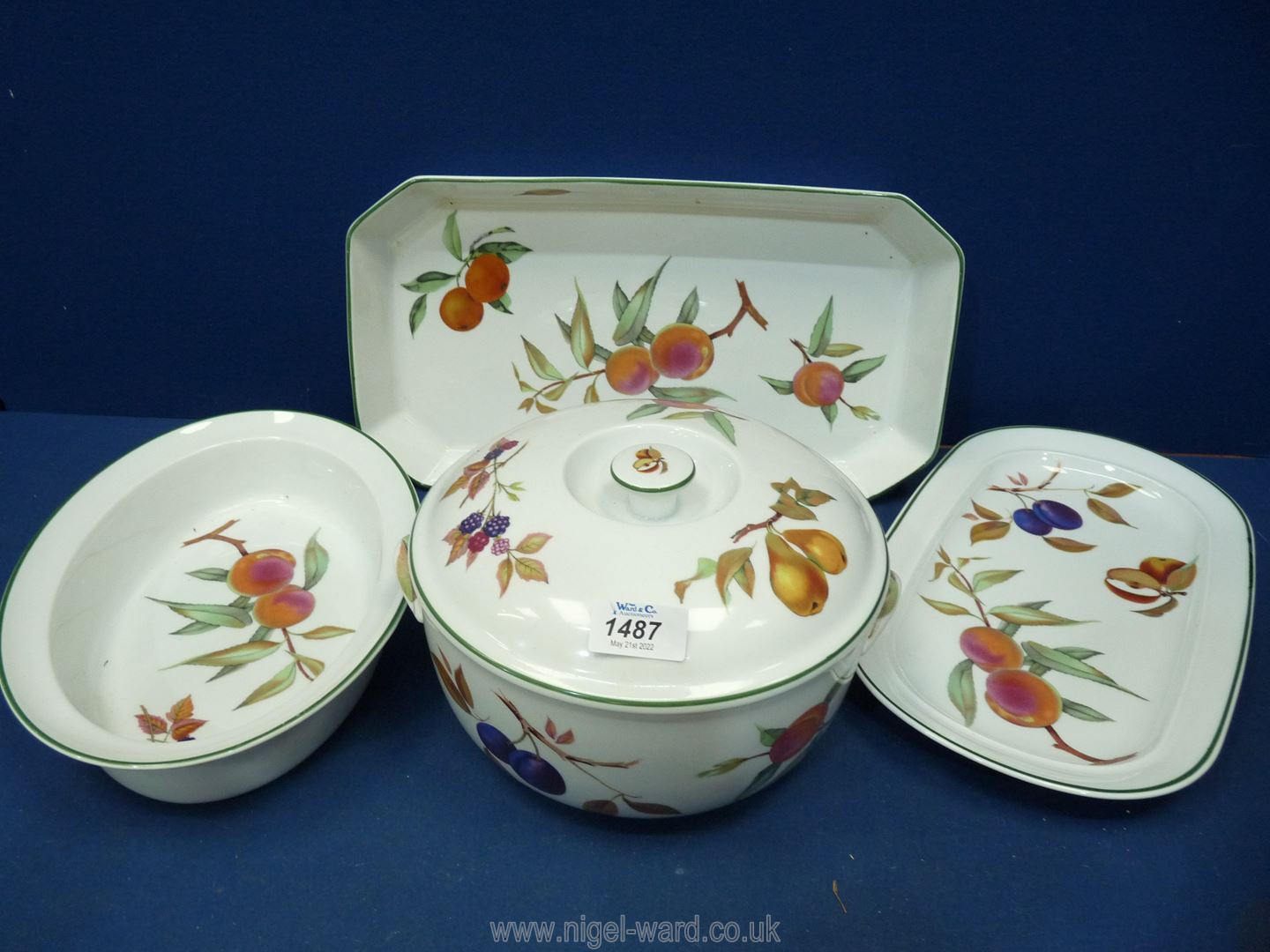 Four pieces of Royal Worcester Evesham with green rims, including large casserole with lid,