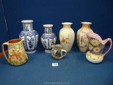 A quantity of vases and jugs including Crown Ducal, Delft style etc.