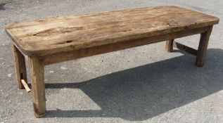 An early, single plank top Refectory Table standing on stop-chamfered square legs,