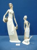 A Lladro lady with goose figure, some damage, missing one goose and stick from hand (a/f.