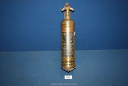 An old Morris brass car fire extinguisher