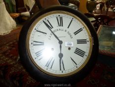 A late 19th c. Wall Clock by J.J. Stockhall, London, 16'' diameter, working with key.