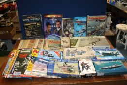 A quantity of Airfix and other airplane model kits,