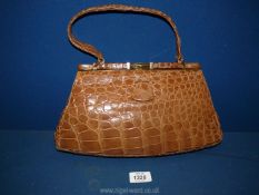 A Hudsons of Wolverhampton brown crocodile skin Handbag.