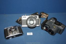 Three cased cameras to include; Olympus AZ-300 Super Zoom, Minolta Super Circuit 3 Hi-Matic 11,