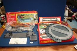 Three boxed Hornby Railway items to include a scale model construction kit 'R195 Electrically