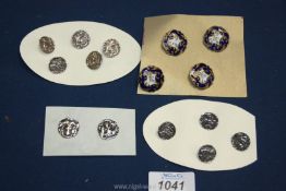 A small collection of silver buttons from 1900 and French enamel buttons.