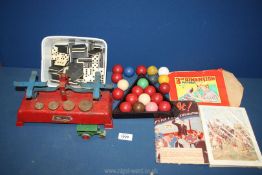 A quantity of games including dominoes, tin plate toy scales, pool balls, Lesney road roller etc.