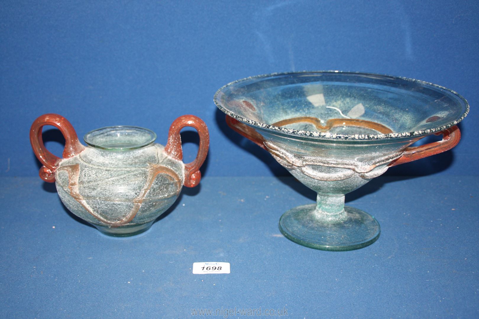 A large unusual Studio Glass footed Fruit bowl with orange glass decoration and matching urn shape