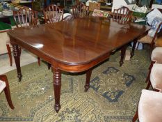 A good William IV extending Mahogany Dining Table comprising a pair of "D" end tables and a large