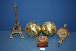 A quantity of models including a model of the Eiffel Tower,