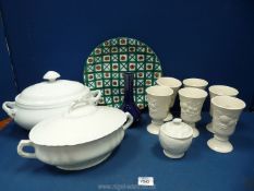 A quantity of china to include two large white lidded tureens, blue vase,