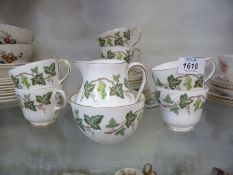 A Wedgwood tea service for six (no teapot) in grape and vine design.