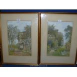 A pair of James Matthews prints of thatched cottages and gardens.