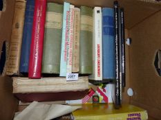 A box of medical reference books.