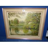 A framed Oil on canvas depicting a large house with grounds leading to a pond with swans,