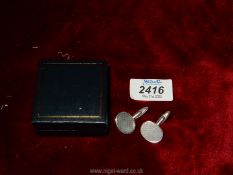 A pair of silver Cufflinks with hallmarks for Birmingham by S.J.