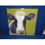 A modern oil over print picture of a cow.