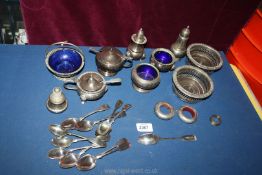 A small quantity of plated cruets with glass liners, wine coasters, sweet baskets etc.