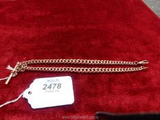 A rolled gold graduated link double watch chain, 14" long. 34g (approx).