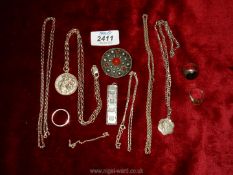 A quantity of silver chains, pendants and rings, ingot, St. Christopher, amber style brooch.