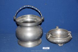 A pewter ashtray 6" wide x 2 1/2" deep and a pewter biscuit barrel 6" tall (no lid).