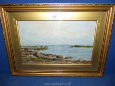 An oil painting of a coastal scene, signed Stuart Rutherford, R.A. label on the back.