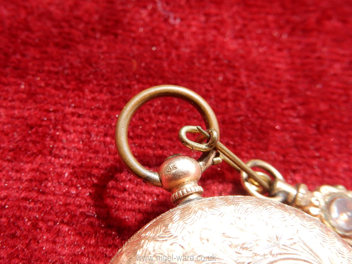 A 14 kt gold wind up Pocket Watch with floral and foliage engravings to the back and centre of the - Image 5 of 5