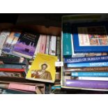 Two boxes of books to include; Buddhism, Atlas of The Ancient World, History of The Arab People,