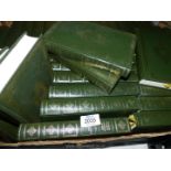 A large quantity of Charles Dickens novels in green by Heron Books.