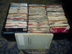 A large hardboard case containing a large quantity of 7'' singles and EP's including Small Faces,