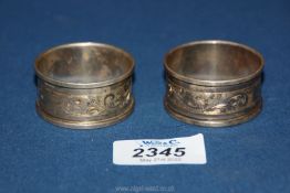 Two engraved silver Napkin Rings, Sheffield 1975 possibly Henry Griffith & Sons, 28 gm. boxed.