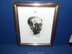 A framed and mounted charcoal portrait of a man. Image size 6 1/4" x 8 1/4".