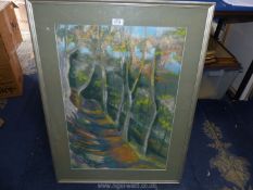 A framed and mounted Pastel drawing depicting a track road through a forest, no visible signature,