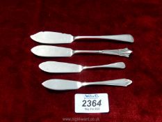 Four silver butter Knives including Birmingham 1922, by Adie Brothers Ltd.