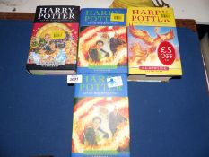 Four Harry Potter books; two volumes of The Half Blood Prince,