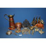 A quantity of mixed brass and copper items including brass model of boat, pair of camber sticks,