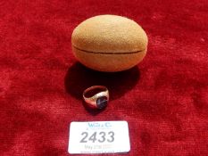 A 15 kt gold signet ring with intaglio stylised bird seal, maker W.D, worn and slightly a/f.