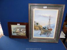 A framed oil on canvas depicting a moored fishing boat with a religious building on the rocks,