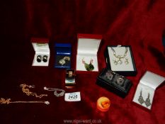 A quantity of costume jewellery including Ciro earrings, Puccini brooch, necklace and earring set,